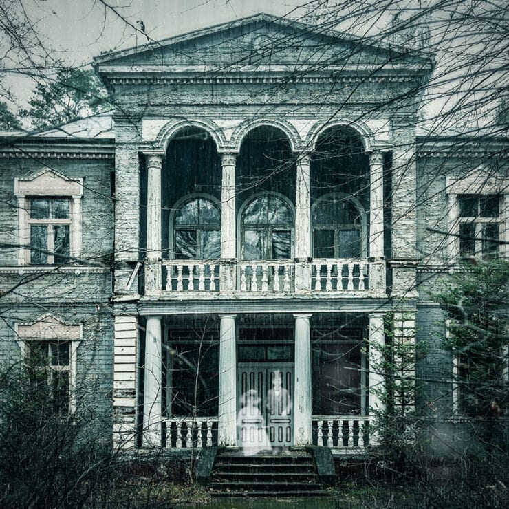 haunted house with ghosts sitting on the porch
