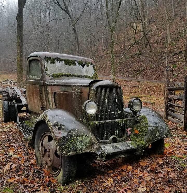 Old truck sitting on the grounds of elys mill